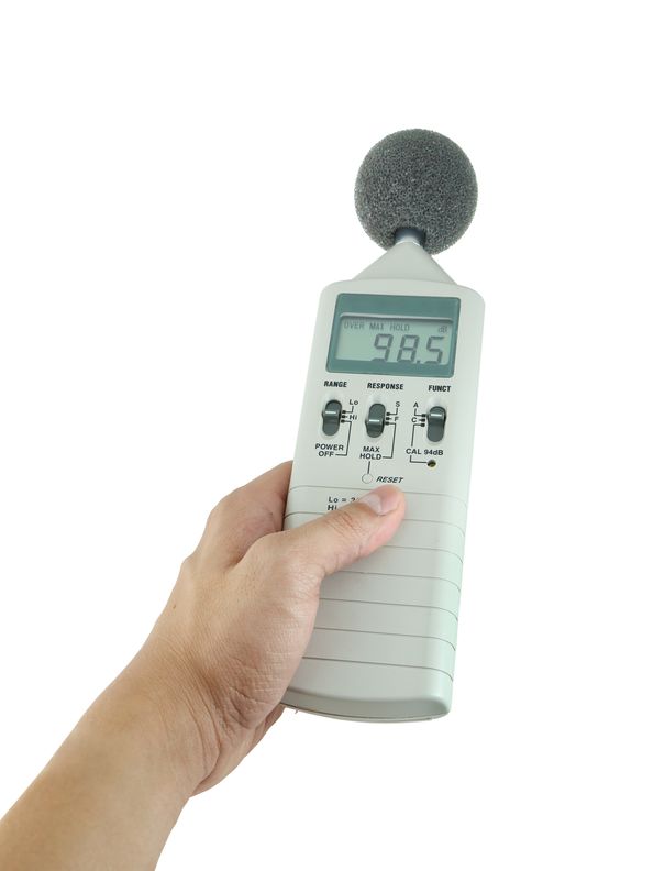 21194803 - sound level meter holding on hand